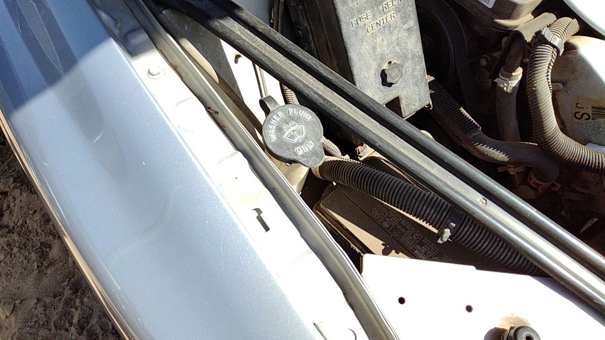 2000 Olds Intrigue Washer Bottle