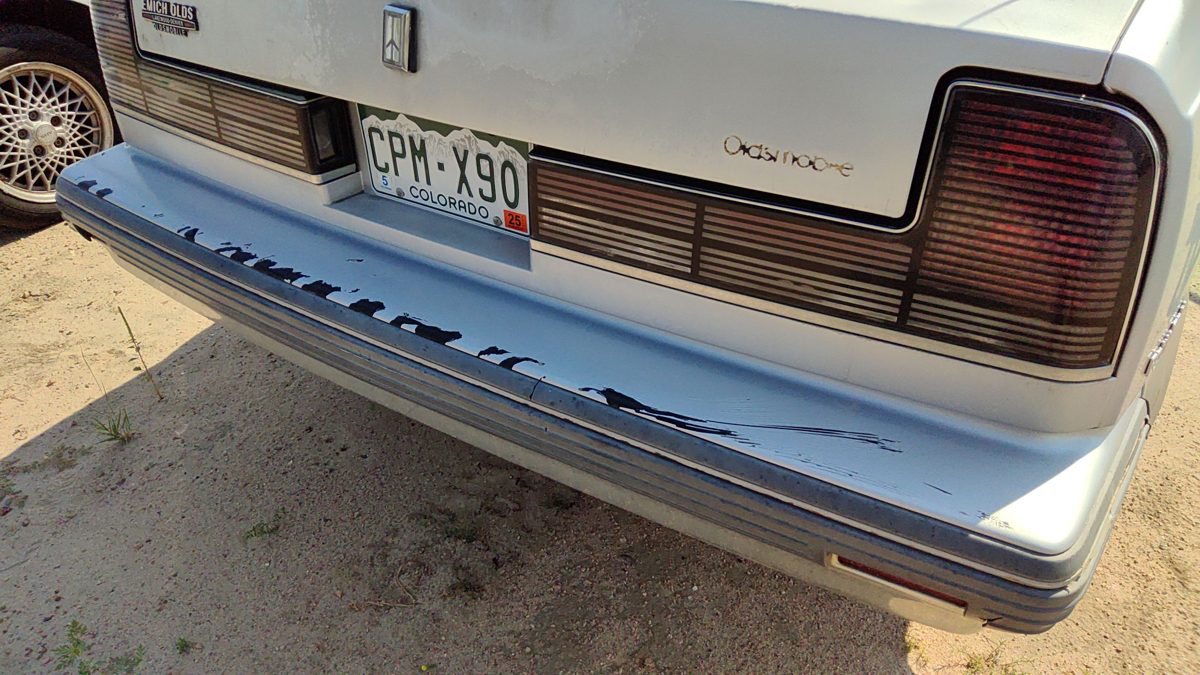 1990-1991 Olds 88 Silver Trim Strip Between Tail Lights And Bumper Oem Panel