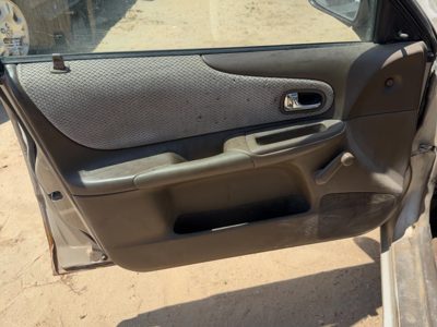 1999-2000 Mazda Protege Dx Driver Left Front Door Trim Panel Manual Brown