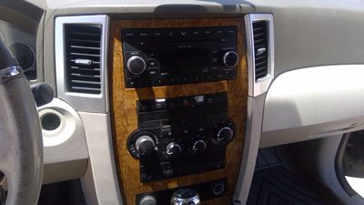 2008-10 Grand Cherokee Trim Bezel Around Radio Surround Dash Panel Oem Woodgrain