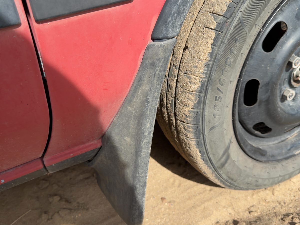 1987-1988 Toyota FX Passenger Right Moulding From Fender OEM Mud Flap