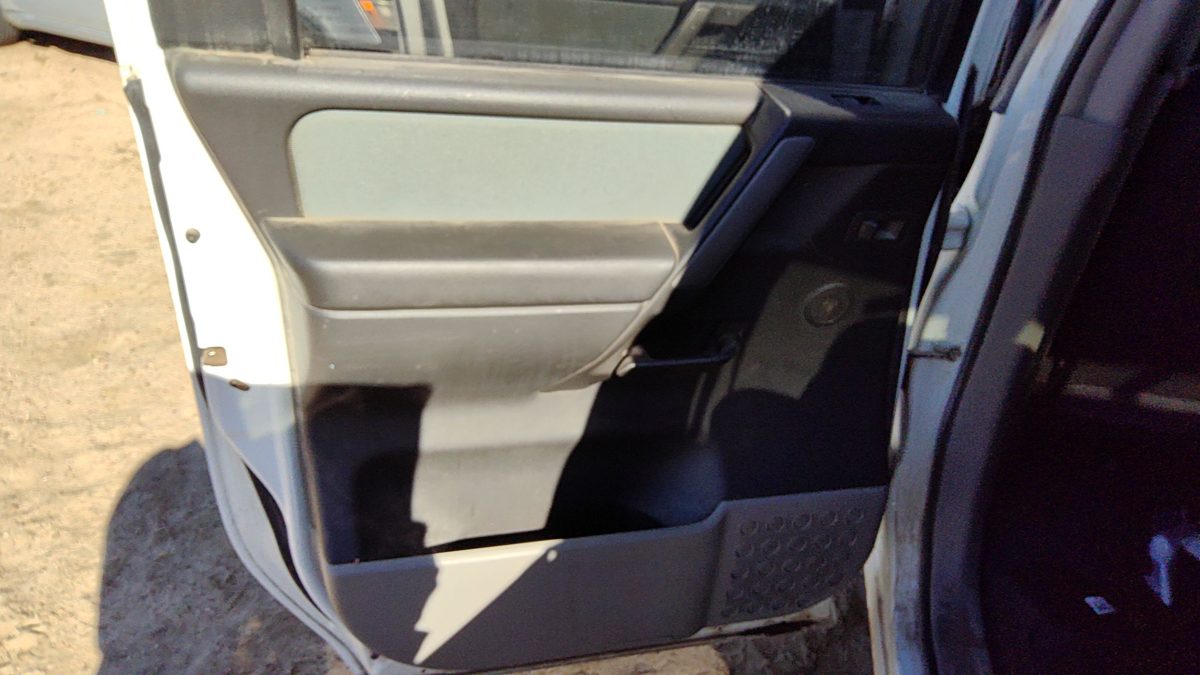 04-07 Titan Driver Left Rear Door Trim Panel With Switches Back W Graphite