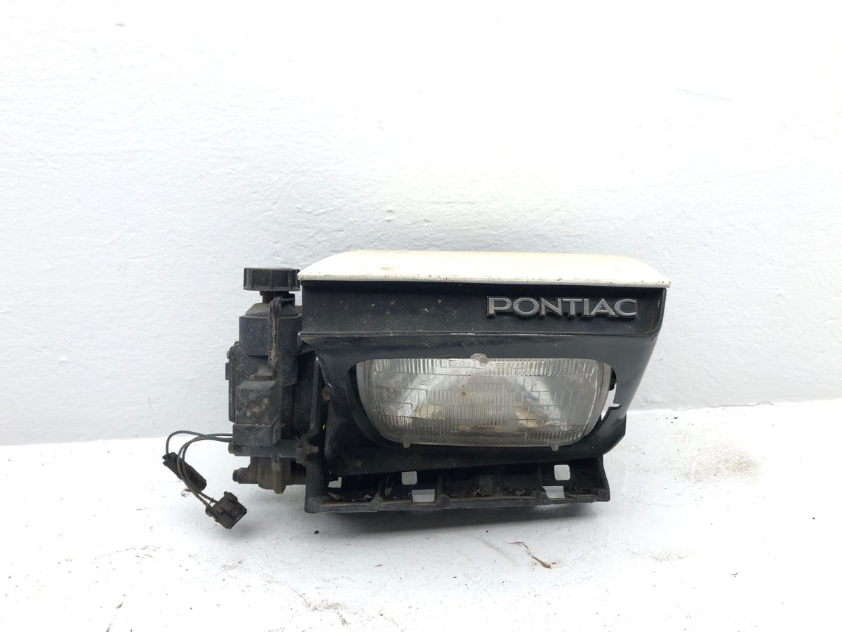 82-90 Pontiac Firebird Driver Left Front Pop Up Headlight Assembly Head Lamp