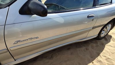 2002 Pontiac Sunfire Front Door