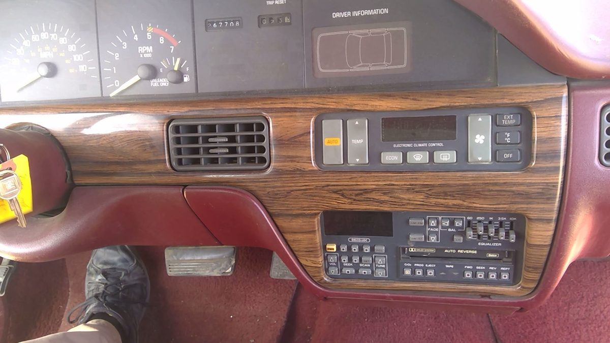 89-91 Pontiac Bonneville Driver Left Woodgrain Dash Trim Bezel Below Speedometer