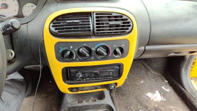2000-2005 Dodge Neon Trim Bezel Around Radio Surround Dash Panel Oem Yellow
