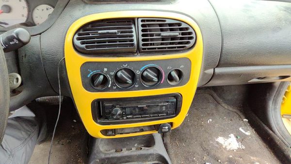 2000-2005 Dodge Neon Trim Bezel Around Radio Surround Dash Panel Oem Yellow — photo 1