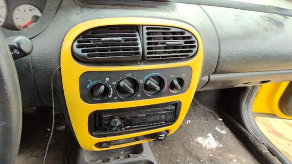 2000-2005 Dodge Neon Trim Bezel Around Radio Surround Dash Panel Oem Yellow — photo 3