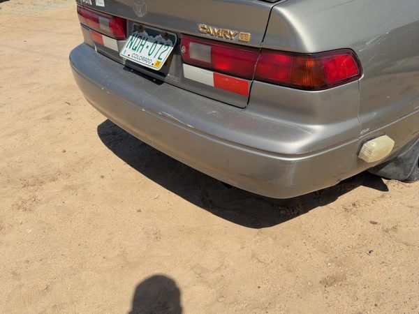 97-01 Toyota Camry Rear Bumper Cover Assembly Antique Sage 1B2 OEM 52159AA900 — photo 1