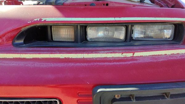 1993 Pontiac Grand Prix Headlight Door LH — photo 1