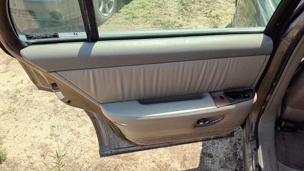 1997-2003 Buick Park Ave Driver Left Rear Door Trim Panel With Switches Back Tan — photo 1
