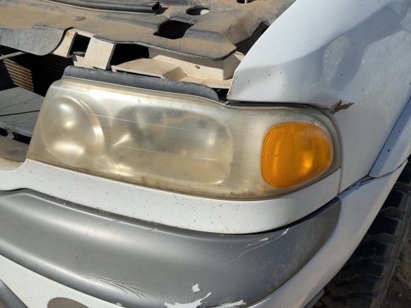 1998 Lincoln Navigator Headlamp Assembly LH — photo 1