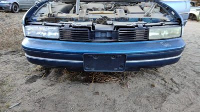 1988-1991 Olds Cutlass Cierra Front Bumper Cover Assembly Oem Blue 10091209