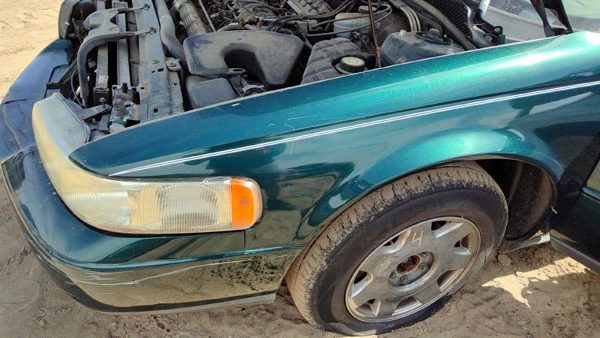 1999 Cadillac Seville Fender LH Green — photo 4
