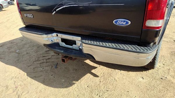 1997 Ford F-150 Rear Bumper Assembly F150 Dented — photo 1