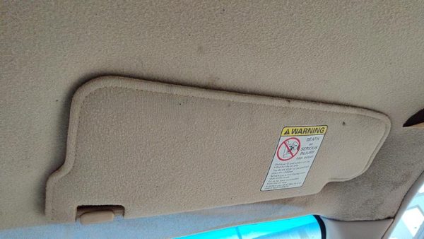 1997 Ford Escort Passenger Right Sun Visor Oem Tan — photo 1