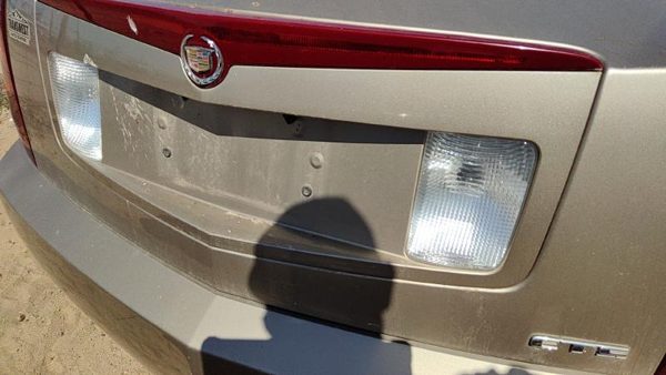 03-07 Cts License Plate Trim Surround Panel Oem Tail Trunk Finish Sand Storm 61U — photo 1