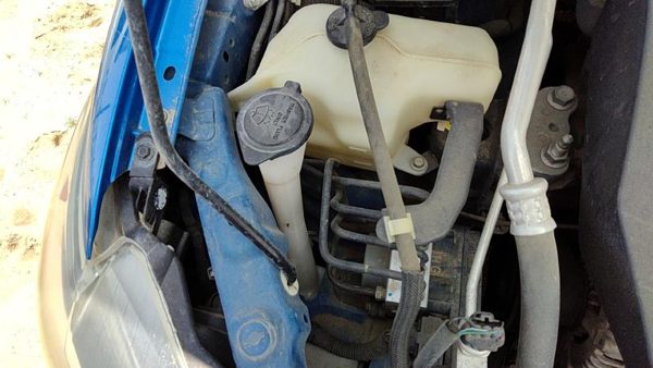 2010 Toyota Corolla Washer Bottle — photo 1