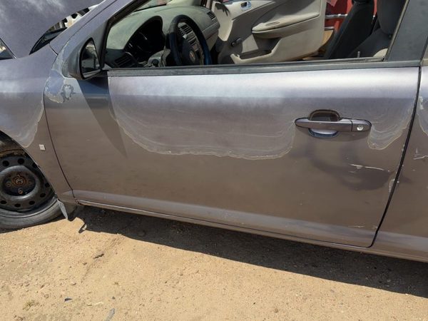 2006 Chevrolet Cobalt Front Door LH Amethyst 84U — photo 1
