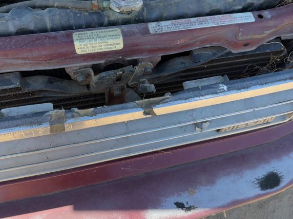 1985-1988 Nissan Maxima Hood Latch Assembly With Bracket Oem 6250015E10 — photo 1