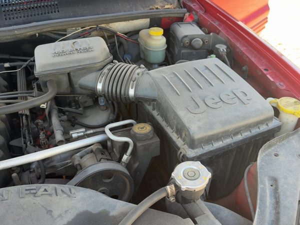 99-04 Grand Cherokee Air Intake Cleaner Filter Box Housing With Tube 4.0L — photo 1