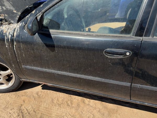 1996 Nissan Maxima Front Door LH Black — photo 1