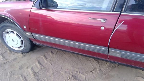 1990 Olds Eighty-eight 88 Front Door LH Red — photo 1