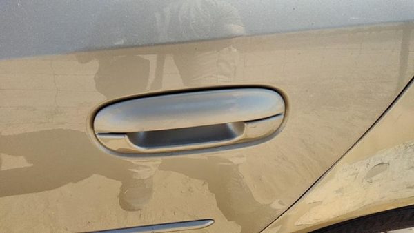 2005 Cadillac CTS Outside Door Handle LH Sand Storm 61U — photo 2