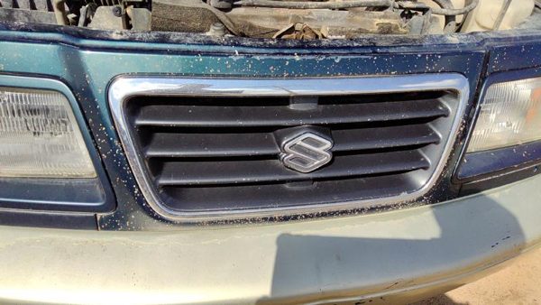 1996-1997 Suzuki Sidekick Front Grille Oem Chrome 7211177E00d2w — photo 2