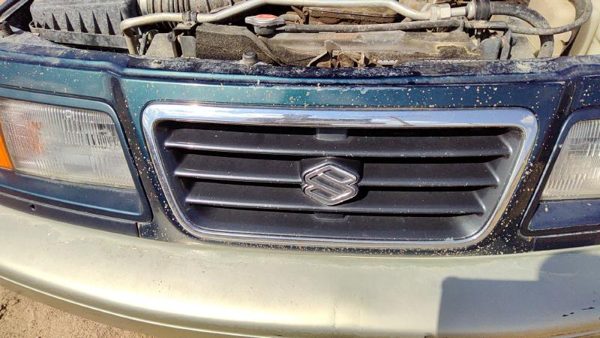 1996-1997 Suzuki Sidekick Front Grille Oem Chrome 7211177E00d2w — photo 5