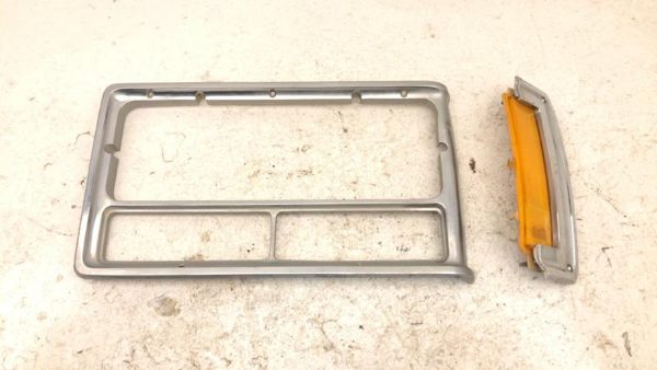 76-77 Regal Driver Left Headlight Chrome Trim With Turn Signal 2 Door 1249957 — photo 1