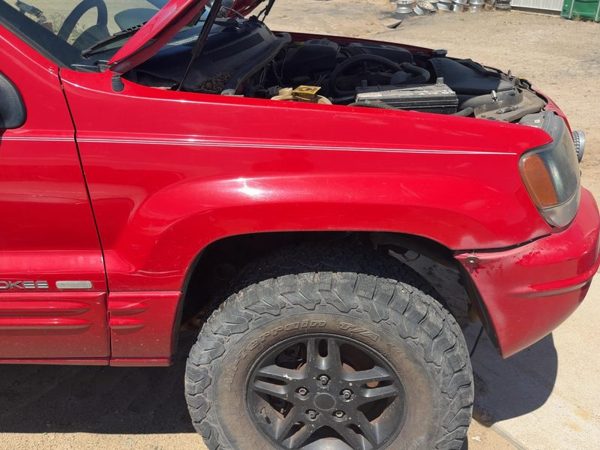 1999-2004 Jeep Grand Cherokee Passenger Right Front Fender Oem Flame Red Pr4 — photo 2