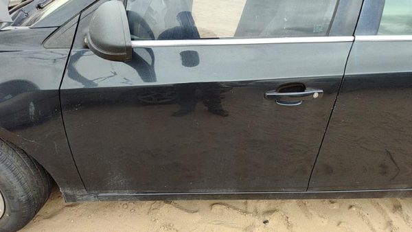 2011 Chevy Cruze Front Door LH Black Gar — photo 1