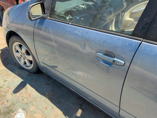 2005 Toyota Prius Front Door LH Blue 8S2 — photo 1