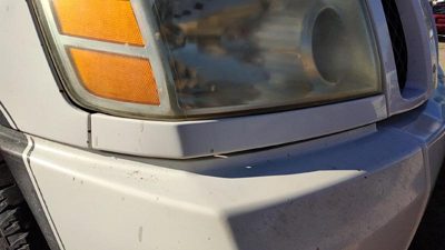 2004 Nissan TITAN Fender Moulding RH Passenger Right Below Headlight OEM Q10