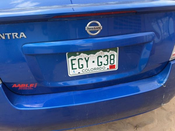 10-12 Sentra License Plate Trim Surround Panel Oem Tail Trunk Finish Blue B17 — photo 1
