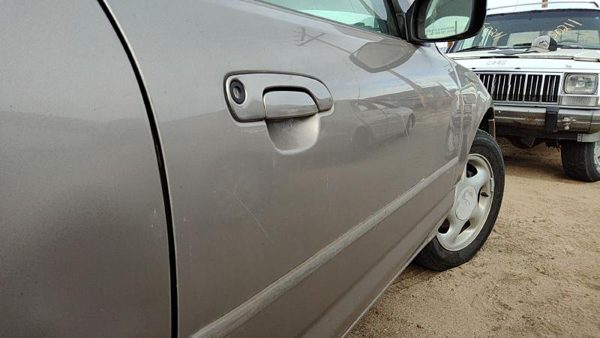 1997 Ford Contour Front Door RH Dk Champagne — photo 3