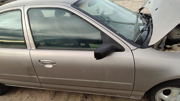 1997 Ford Contour Front Door RH Dk Champagne — photo 1
