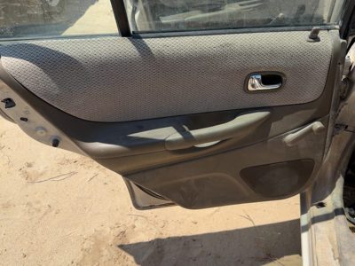 1999-2000 Mazda Protege Dx Driver Left Rear Door Trim Panel Manual Back Brown