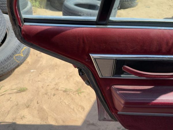 1986-1988 Olds 88 Driver Left Rear Door Trim Panel With Switches Back — photo 3
