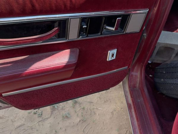 1986-1988 Olds 88 Driver Left Rear Door Trim Panel With Switches Back — photo 4