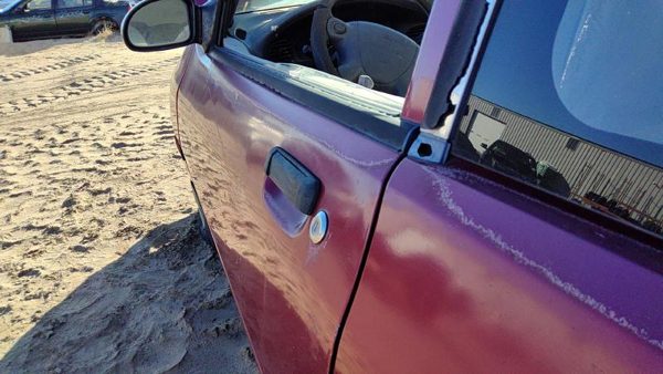 1997 Ford Aspire Front Door LH E5 Red Hail F4BZ6120124A — photo 4