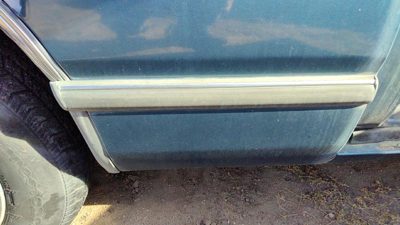 88-91 Olds Cutlass Cierra Passenger Right Rear Lower Moulding On Quarter Panel