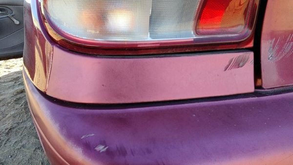 1995-1997 Ford Aspire Driver Left Rear Moulding On Quarter Panel Oem E5 Red — photo 1
