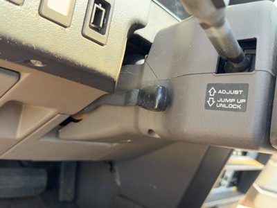 1985-1988 Nissan Maxima Clam Shell Steering Column Trim Gray OEM 6810042E00