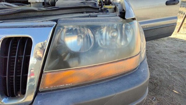 1999-2004 Jeep Grand Cherokee Driver Left Head Light Oem Front Lamp 55155129Ag — photo 1