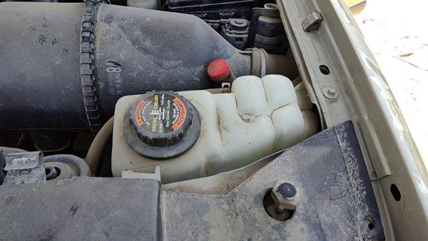 1998 Lincoln Navigator Coolant Recovery Bottle — photo 1