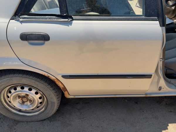 2000 Mazda Protege Rear Door RH Champagne Silver 4F — photo 3