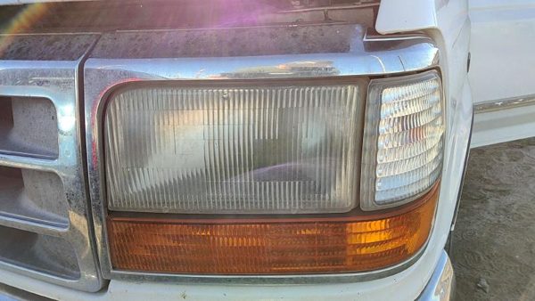 1995 Ford F150 Headlight Door LH — photo 1