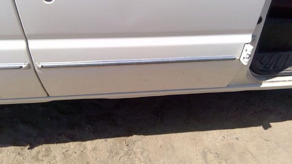 93-04 Van E150 Passenger Right Rear Moulding From Forward Door Back Trim Strip — photo 1